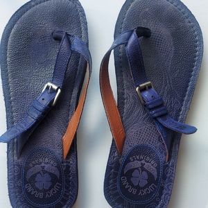 Purple Lucky Brand flip flops size 7